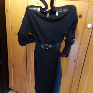 Black sweater with zippers on both shoulders with leather trim on zippers,  s